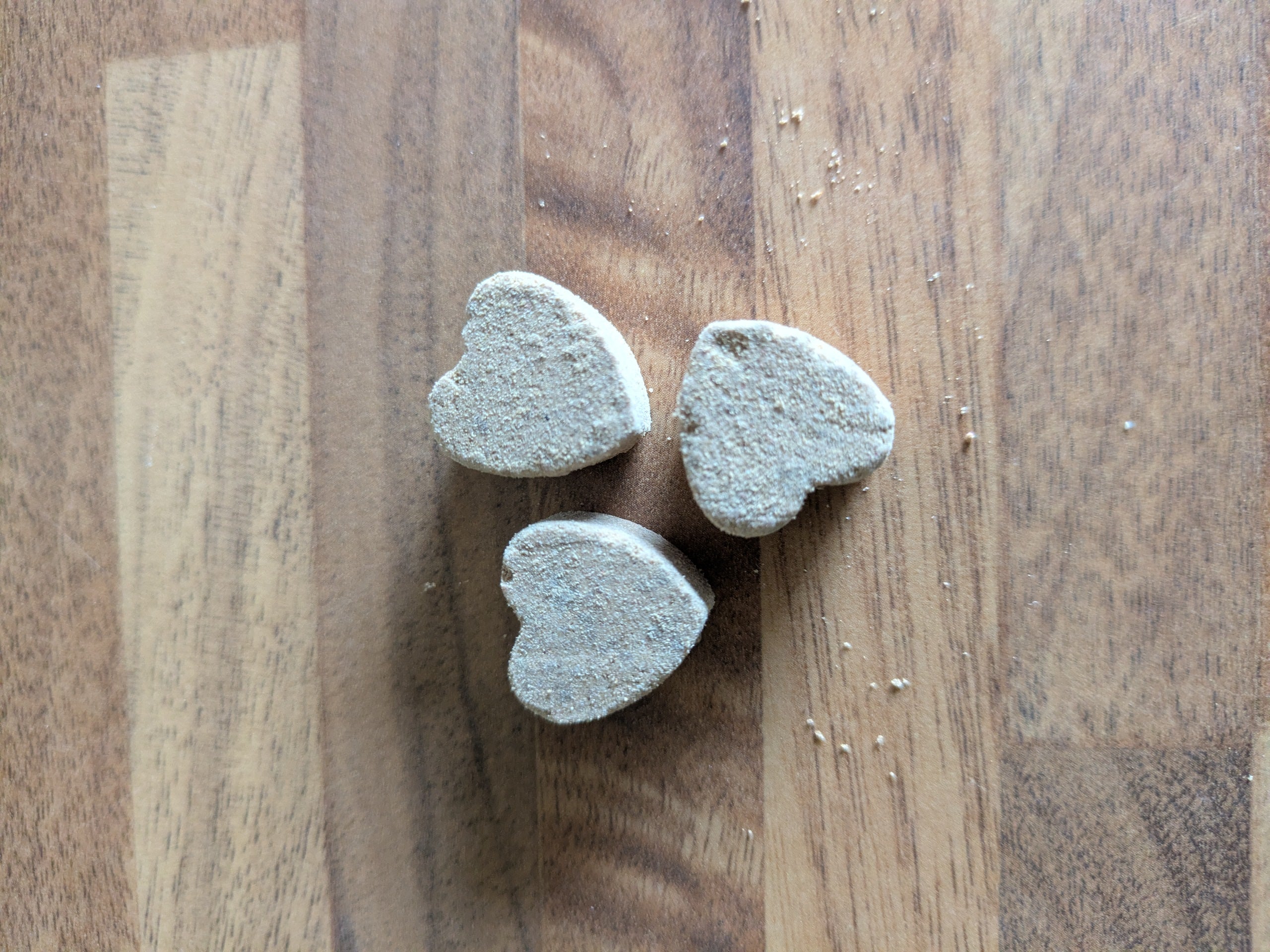 A piece of Pure Pawsome Calming chews for dogs